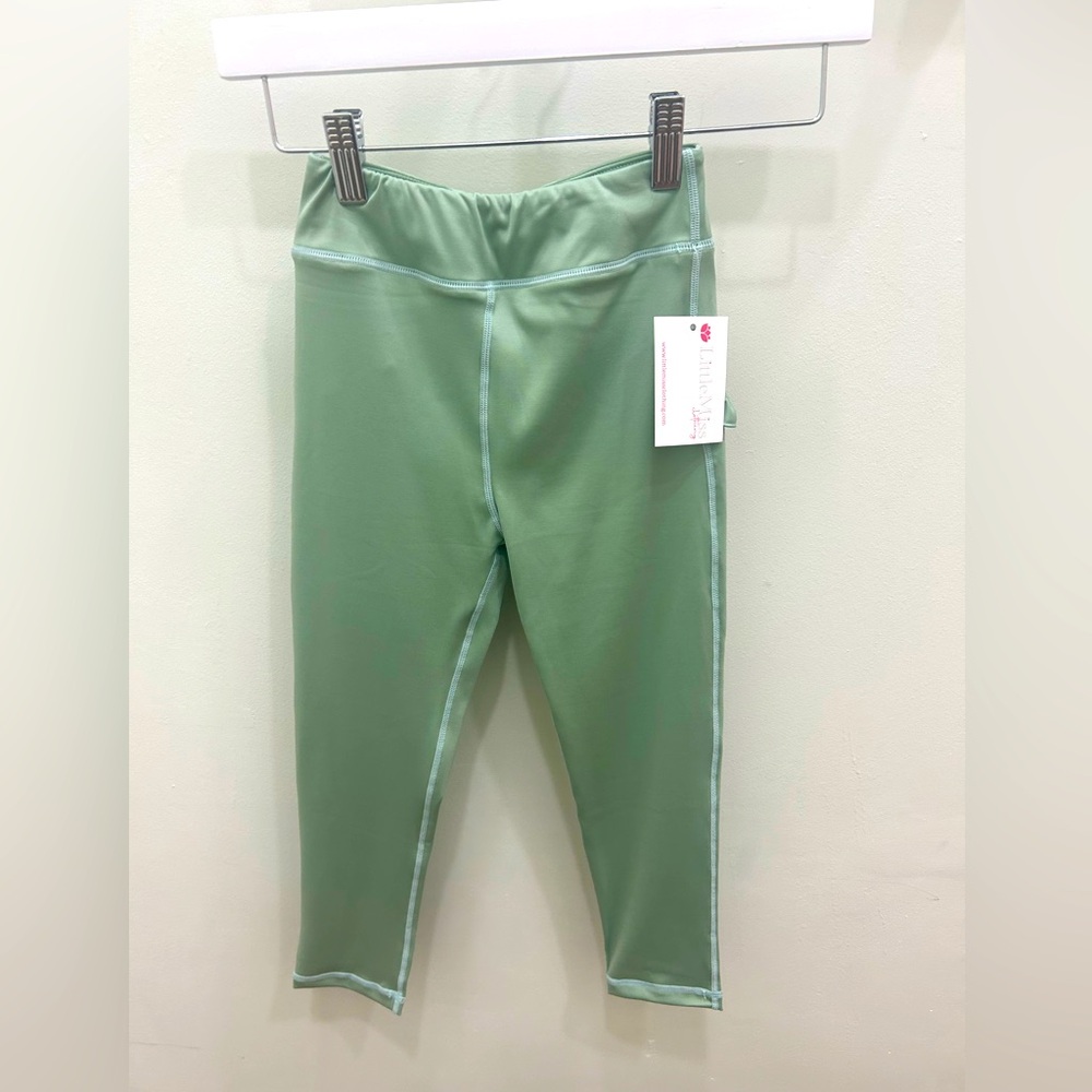 Green ruffle butt leggings